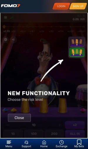 Mr. Thimble game interface with arrow pointing to new risk level selection feature labeled 'Standard' and 'Easy' on FOMO7 app.