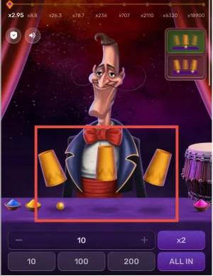 Mr. Thimble standard mode gameplay showing a single yellow ball placed under one of three golden cups on a purple table.
