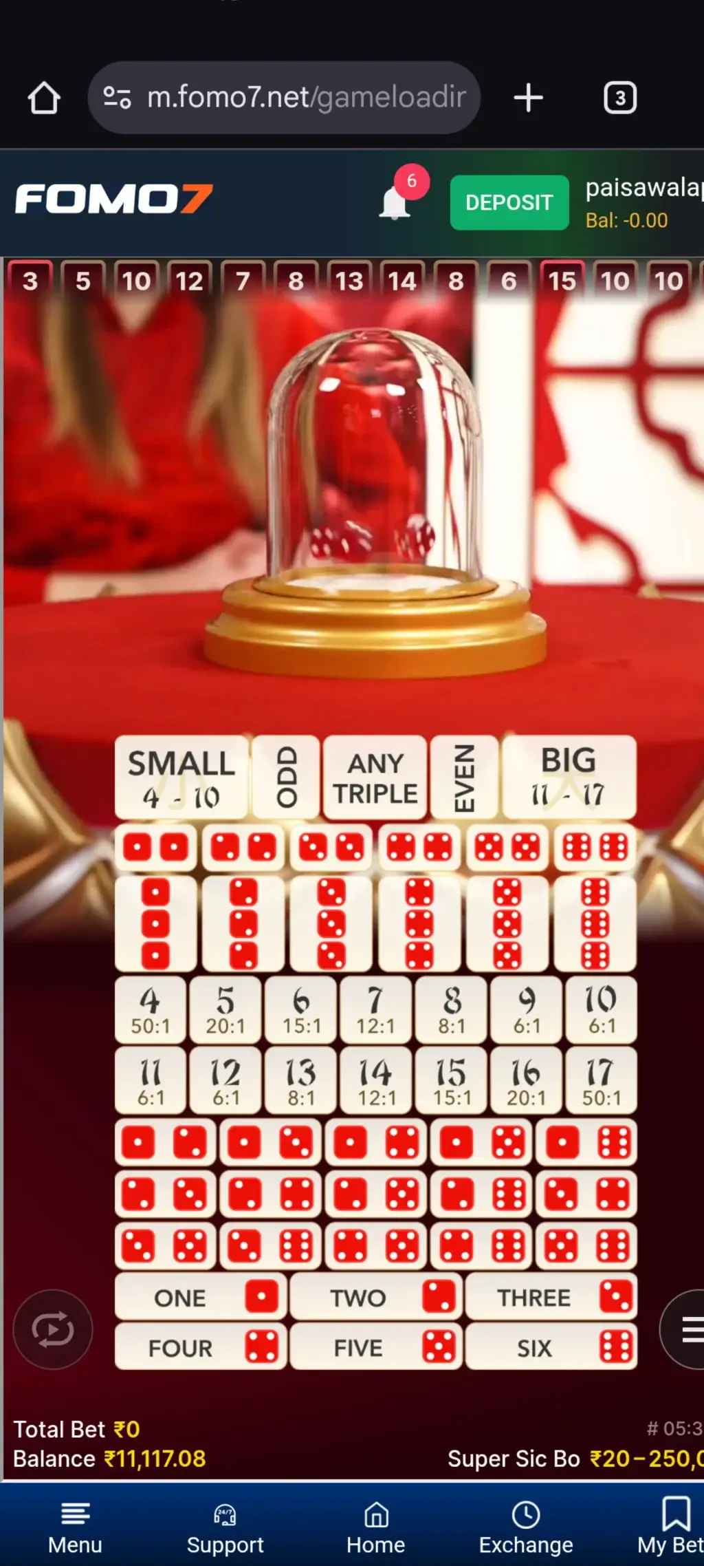 The mechanical dice shaker in a Super Sic Bo live game session about to reveal the winning combination of three dice.