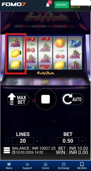 Fruity Reels spin in progress with the first reel frozen and highlighted, showing the reel-freeze feature during a spin.