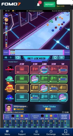 KM Marble Knockout live race in progress with marbles rolling down the track, bets locked at 10 chips total across all four teams.